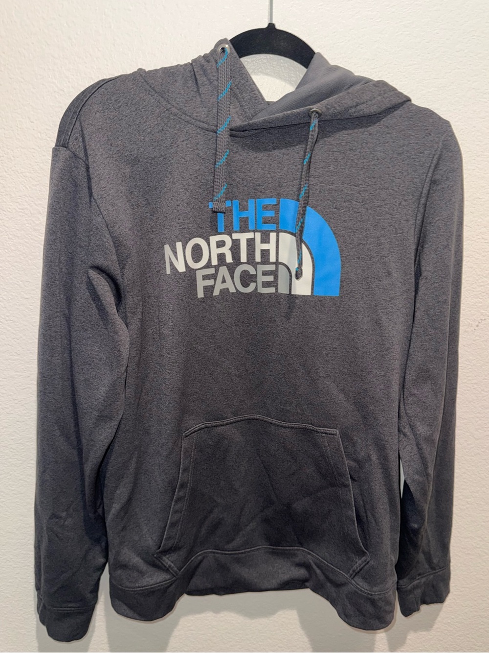The North Face Charcoal Hoodie with Bright Blue Logo